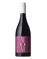 Atom Syrah with purple label and white writing 